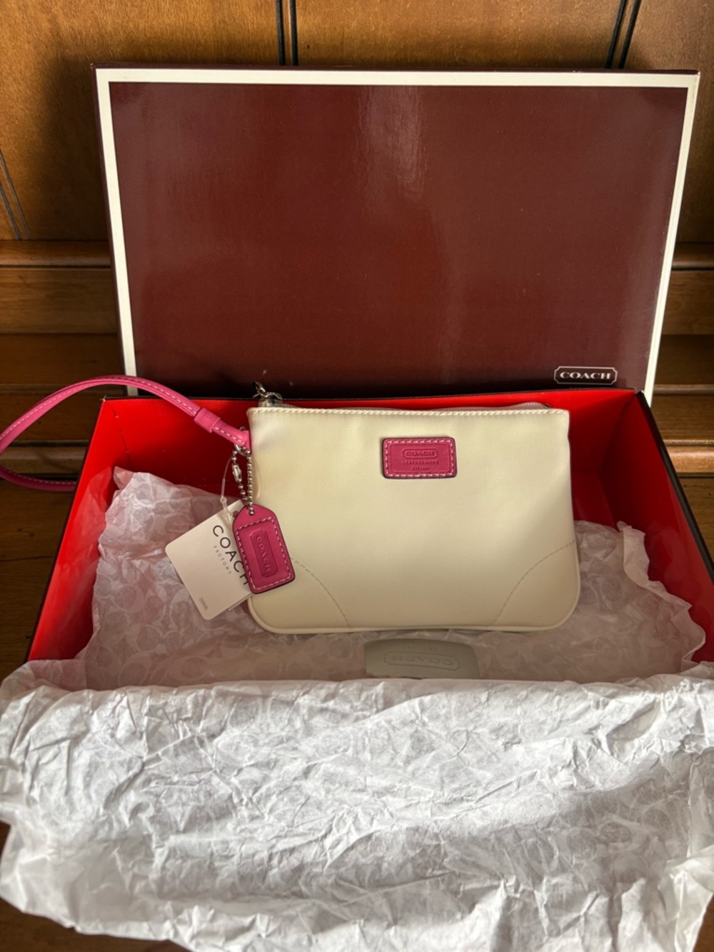 COACH Ivory Wristlet with Pink Trim and Strap